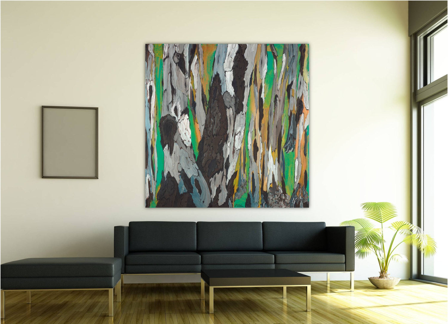Oversized abstract green artwork on huge blank wall in modern setting above sofa.