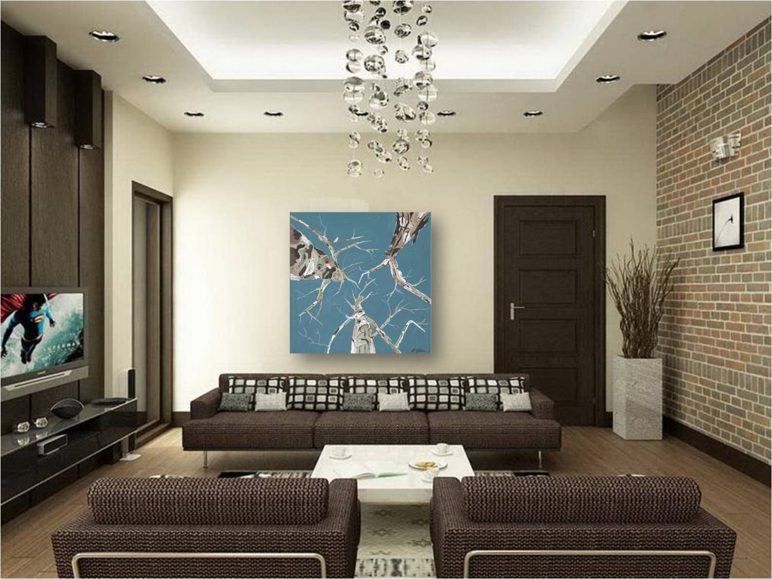 Extra large canvas print of tree artwork in Tiffany blue on empty wall of MCM mid-century modern room