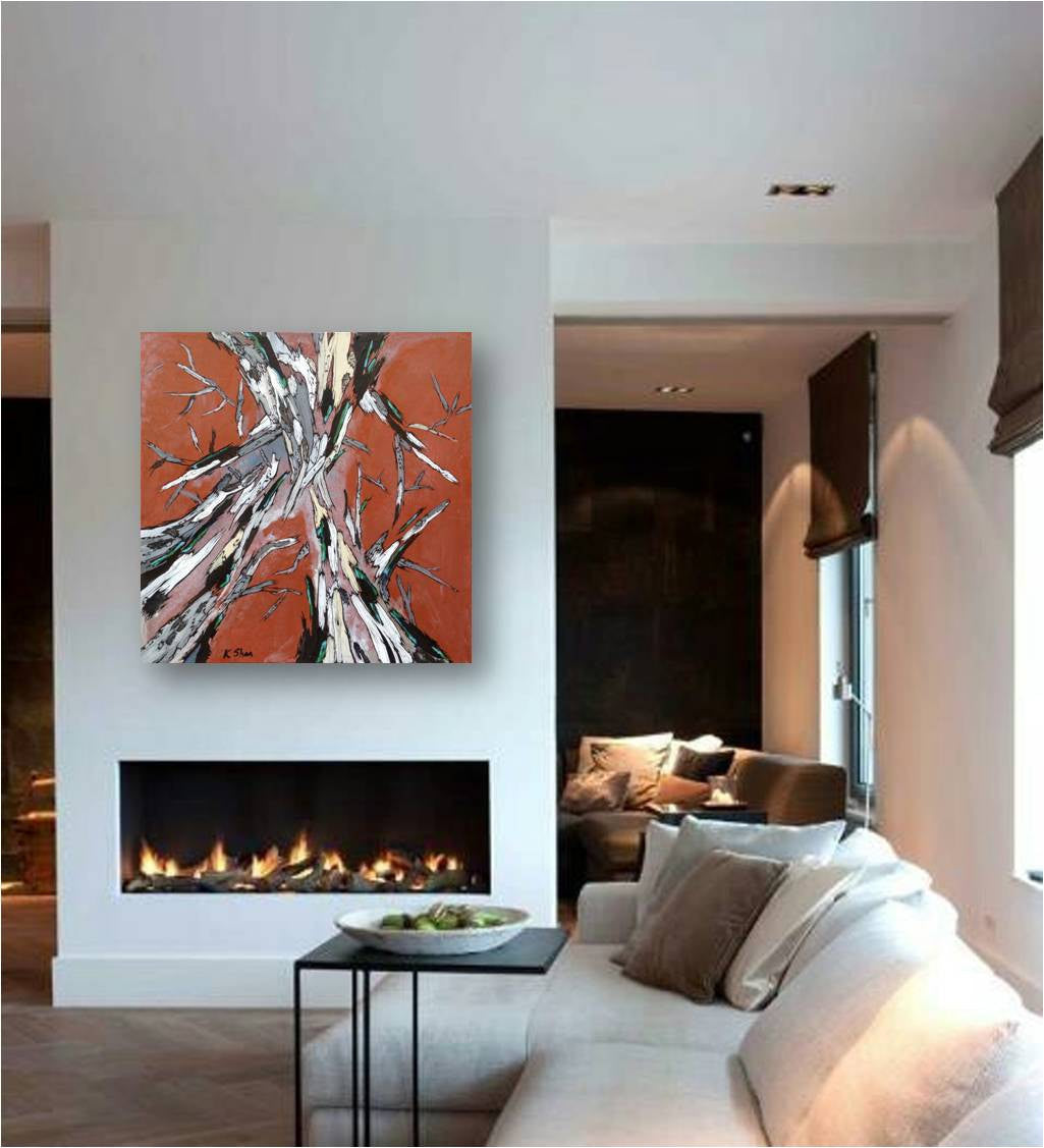 Large burnt orange canvas print on wall above modern fireplace of all white living room
