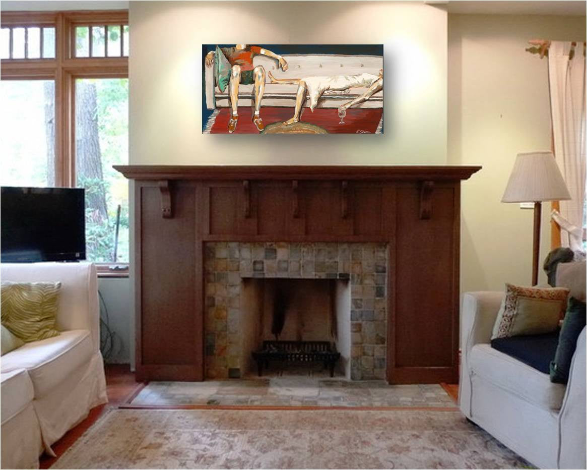 Canvas art print of a couple hanging out on the couch with wine watching tv - hanging above the wood mantle of fireplace