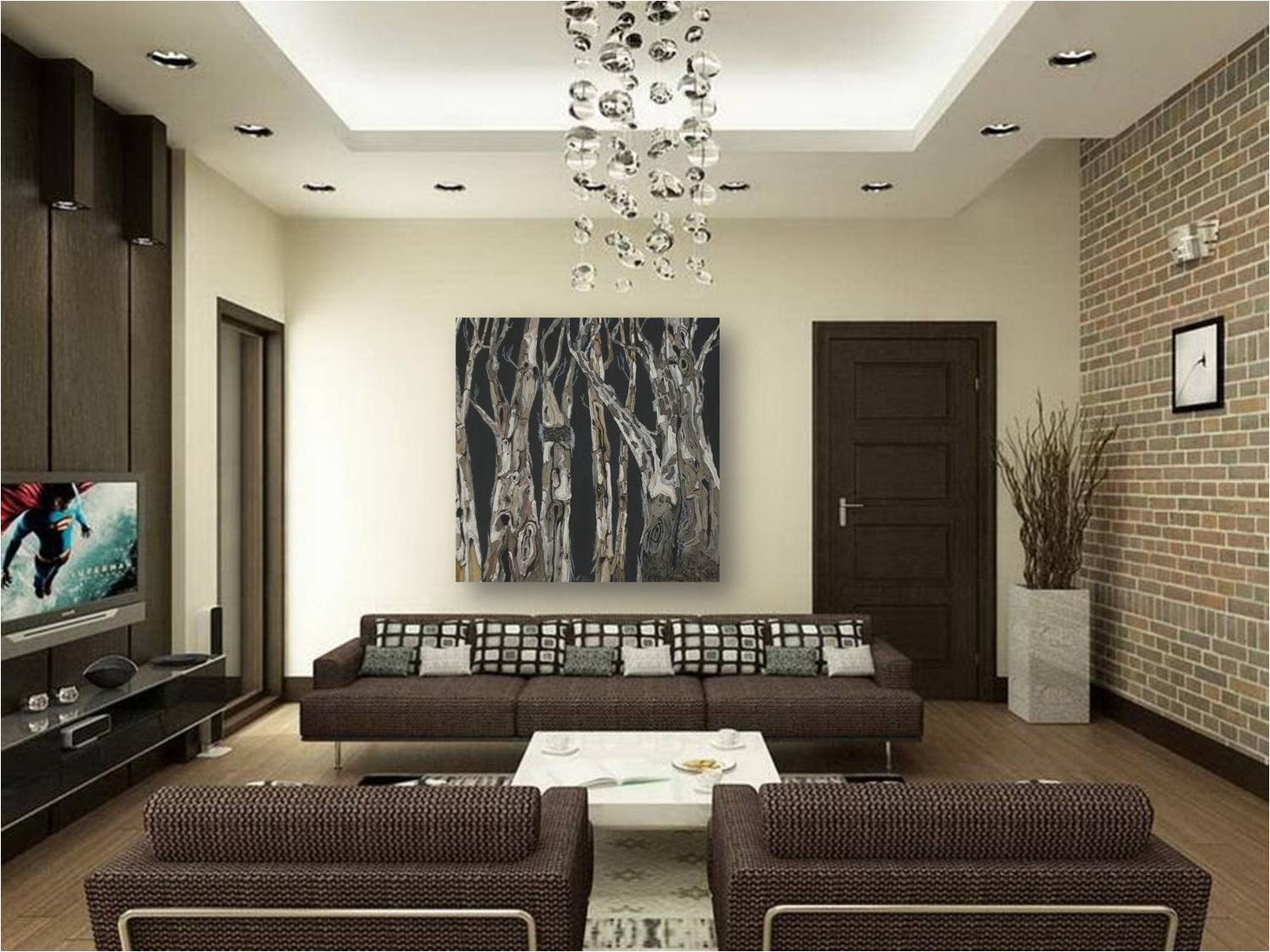 Oversized square moody dark wall art with trees in a large MCM mid-century modern living room