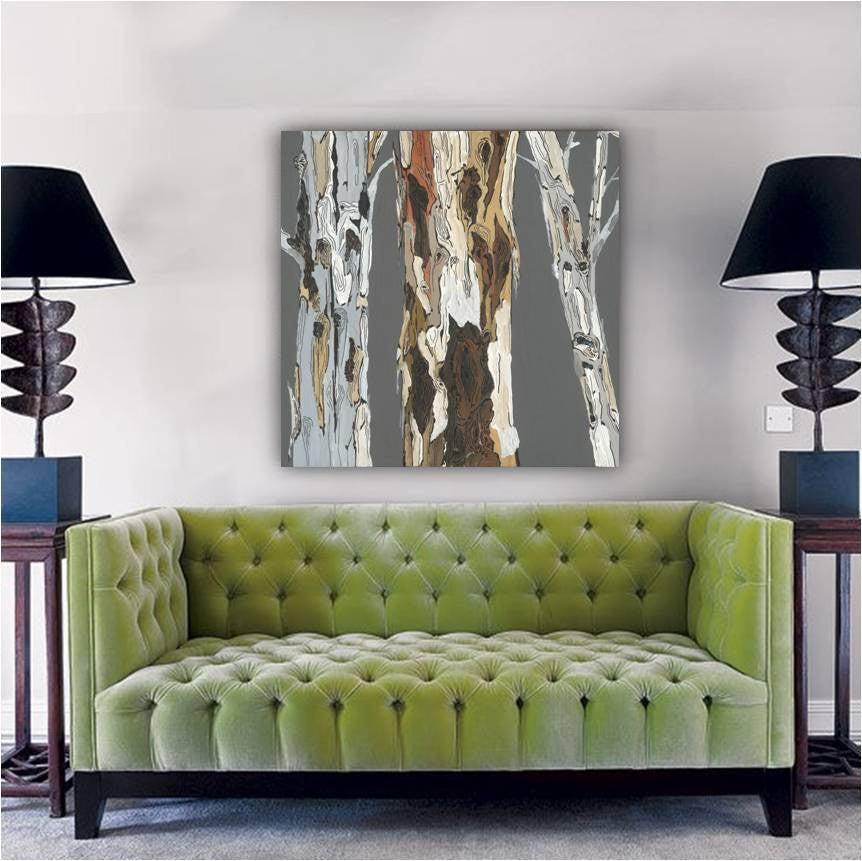 Oversized square canvas wall art above plush mint green velvet art deco couch