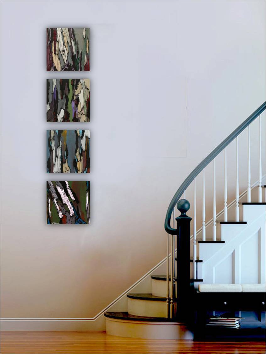 Set of 4 small original abstract paintings of trees in a gallery setting at the entry by a staircase. Paintings are in acrylics, ink, oil pastels.