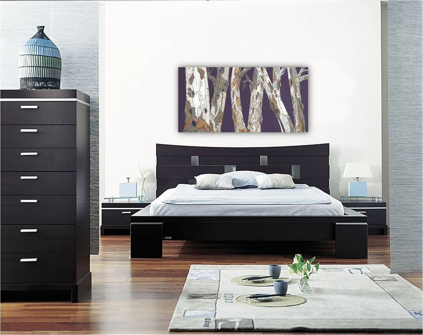 A large horizontal wall art canvas print of trees in purple and white over a huge bed in a transitional decor bedroom.