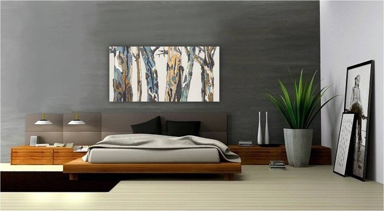 Oversized horizontal artwork of trees hung on a dark wall in a MCM mid-cenury modern bedroom.
