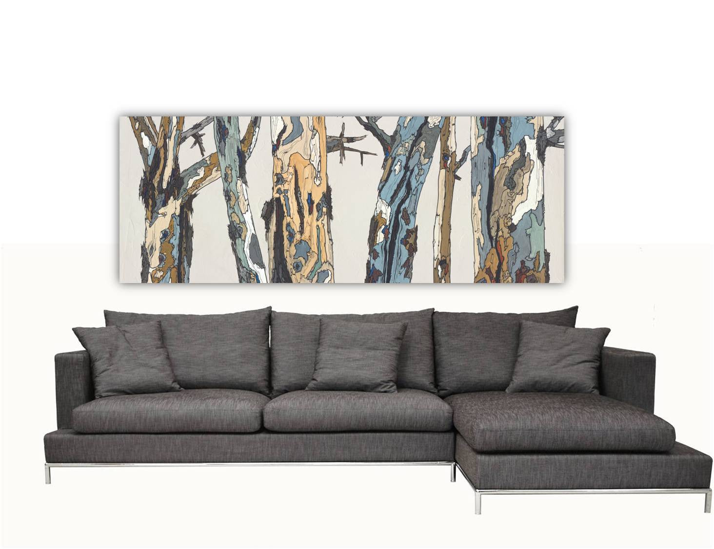 Huge Horizontal Tree Landscape Art Print in a modern contemporary living room w a large sectional sofa