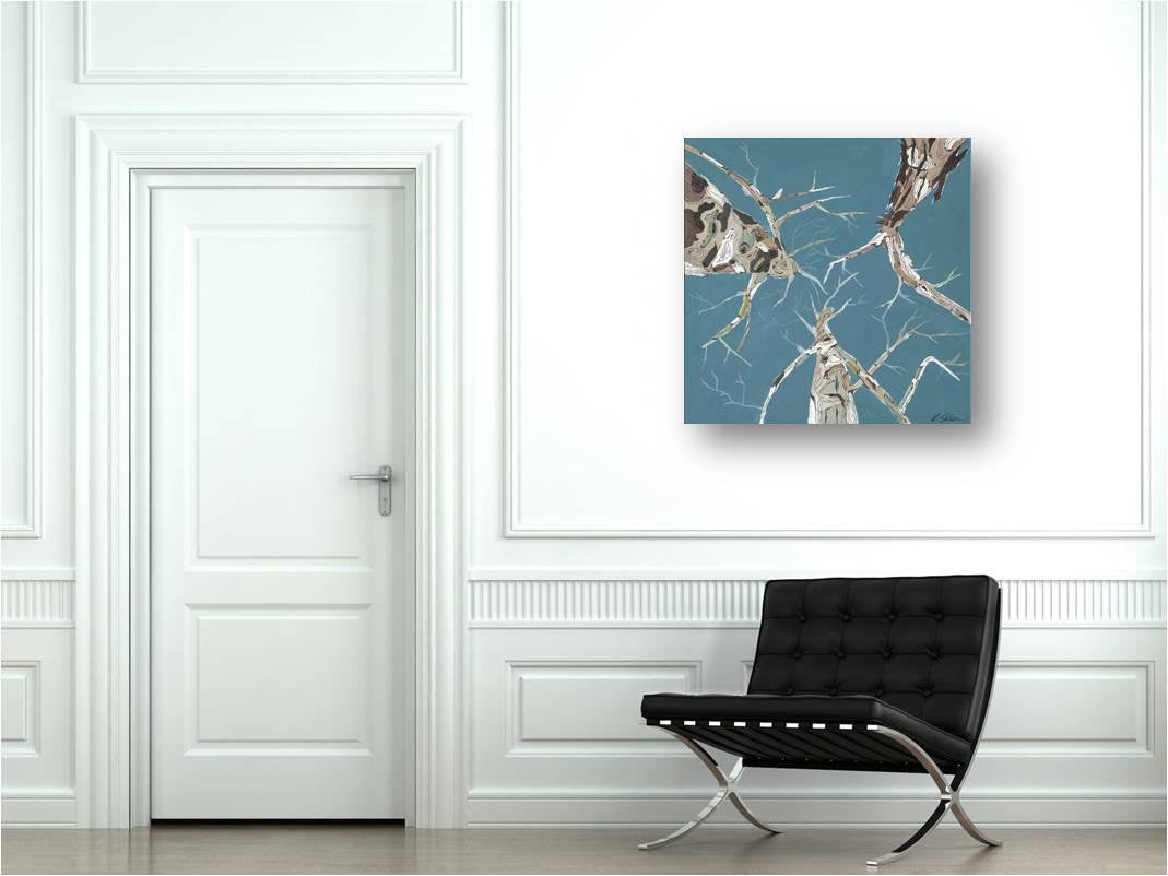 Baby blue canvas art print of trees on white walls of traditional large hallway