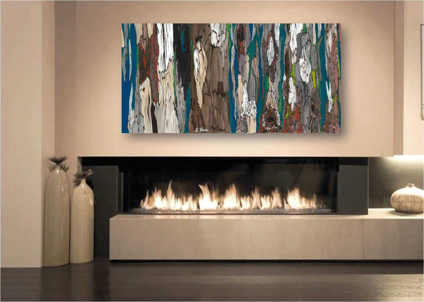 Large blue and white artwork above flush mount extra wide fireplace in modern hotel lobby or home