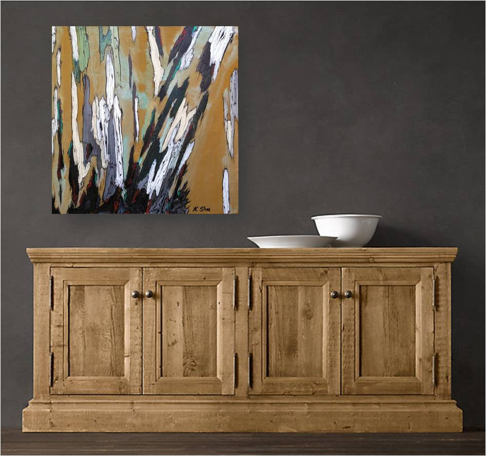 Original painting of abstract trees in ochre on a dark wall of a rustic modern entryway