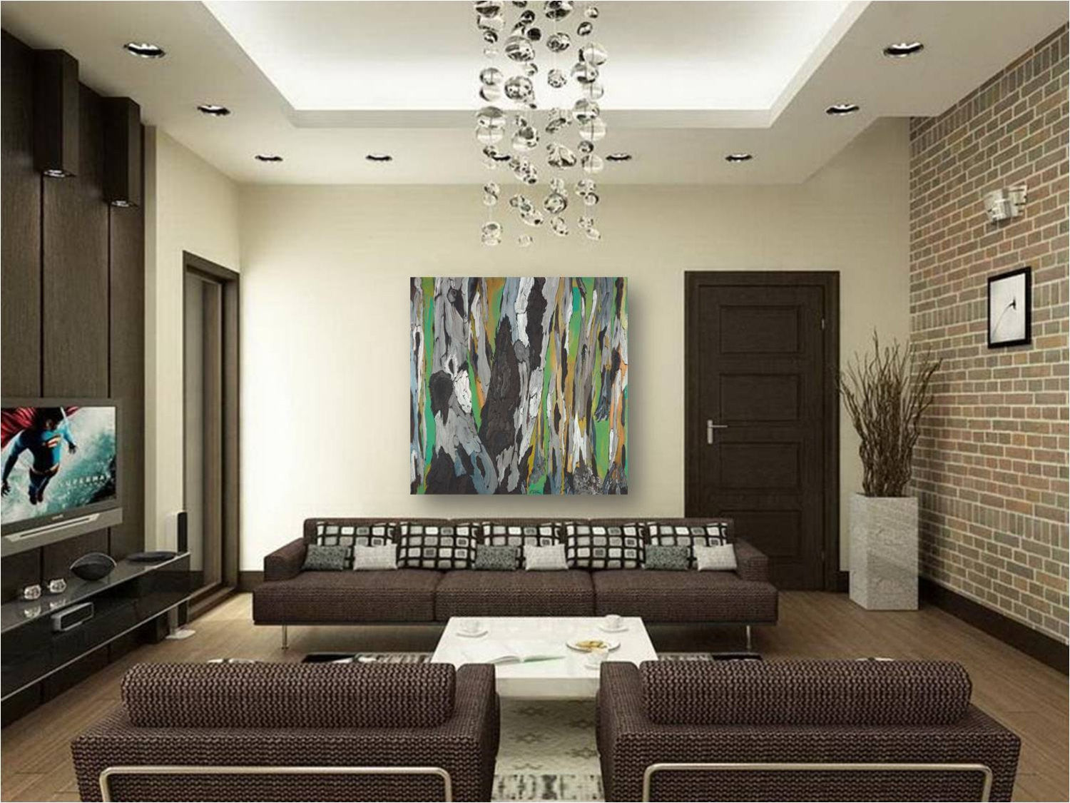 Very large abstract green wall art in MCM living room on huge blank wall.