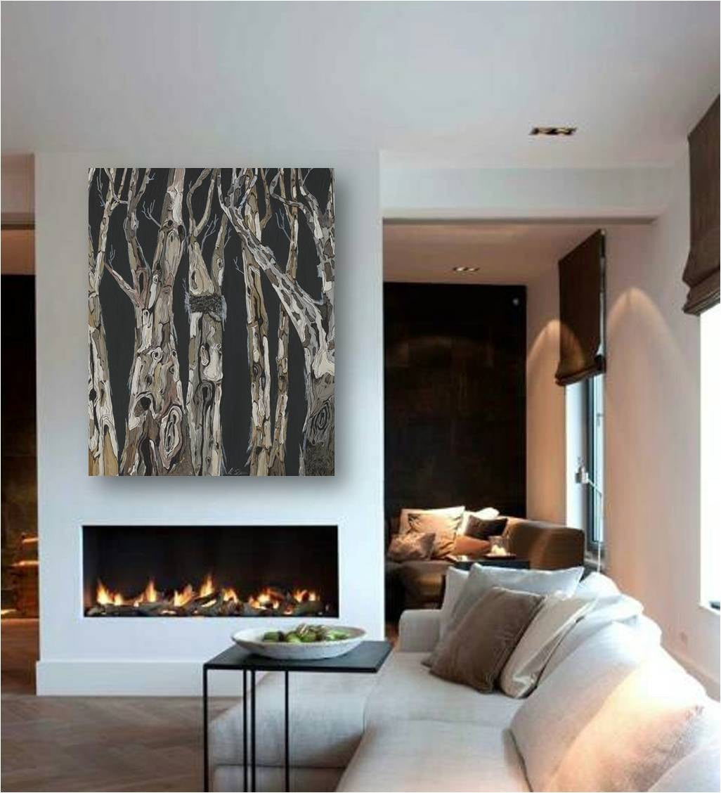 Large vertical dark colored artwork of tree landscape over the modern fireplace of a living room