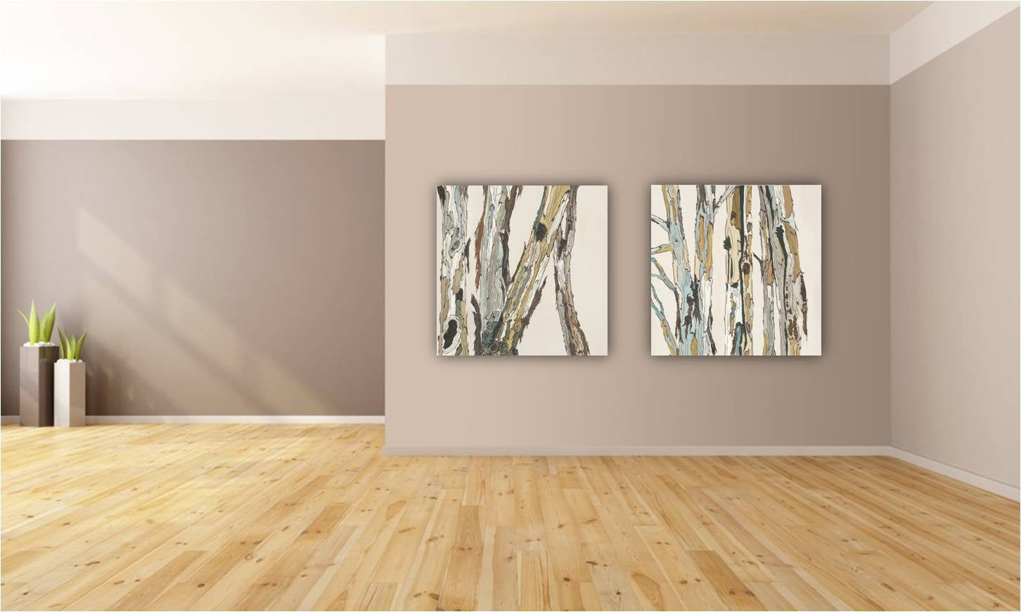 A set of two (diptych) neutral colored artwork on an extra large living room wall