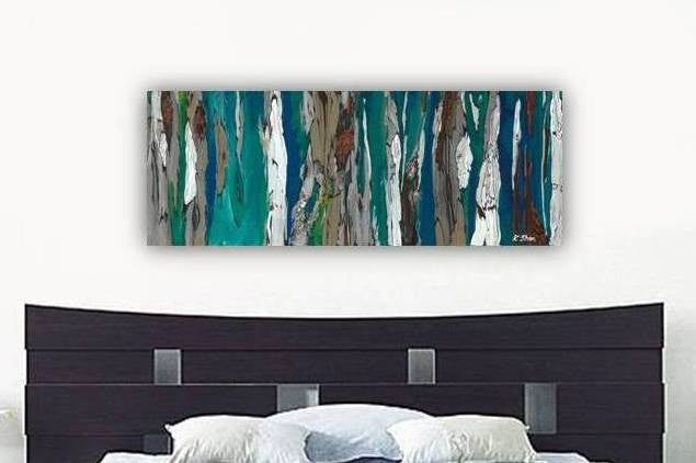 Abstract blue and white canvas art over bed in modern contemporary bedroom or hotel room