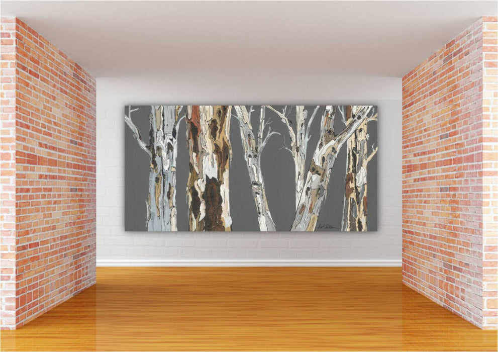 Oversized horizontal gray canvas art print of tree landscape in large commercial space