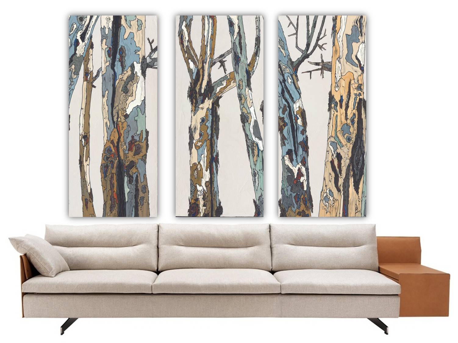 Extra large tall triptych in pastel shades hung over a white MCM sofa. Trees landscape wall art.